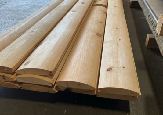 Premium Eastern White Pine log siding boards in stock at Merrimac Log Homes
