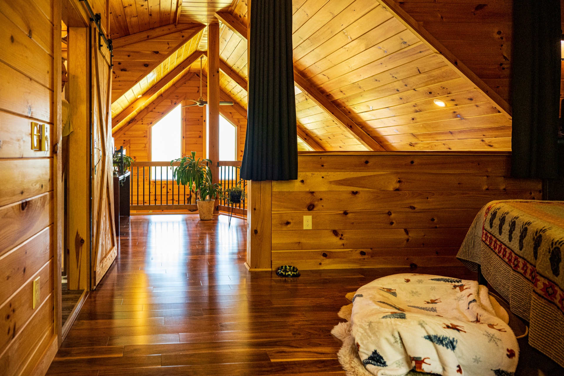 Ossipee loft hallway with sloped ceiling looking toward the loft bedroom