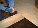 Installing Flooring  -  Log Cabin Kit Pictures